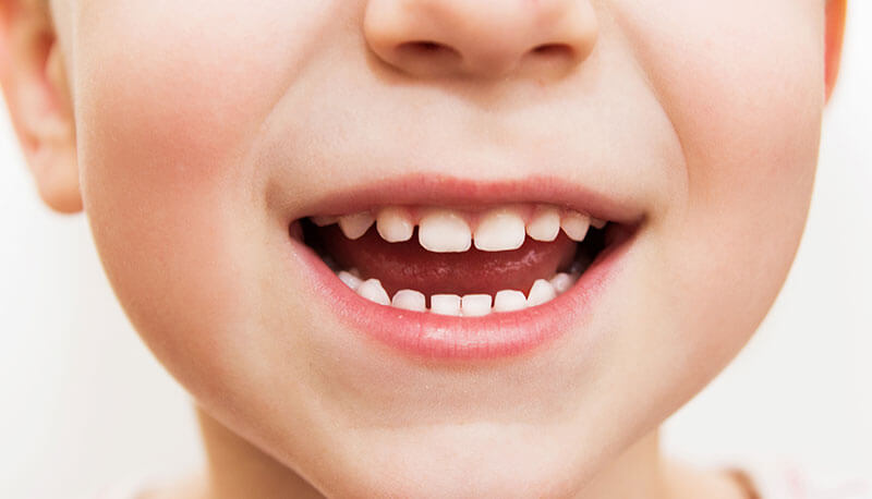 smiling child for first dentist visit