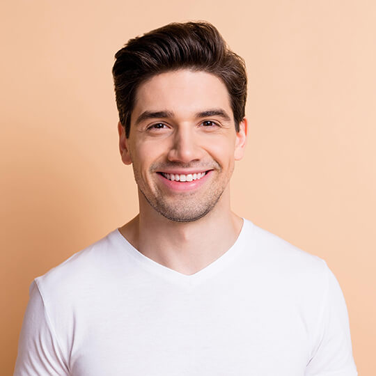 man smiling to show good teeth